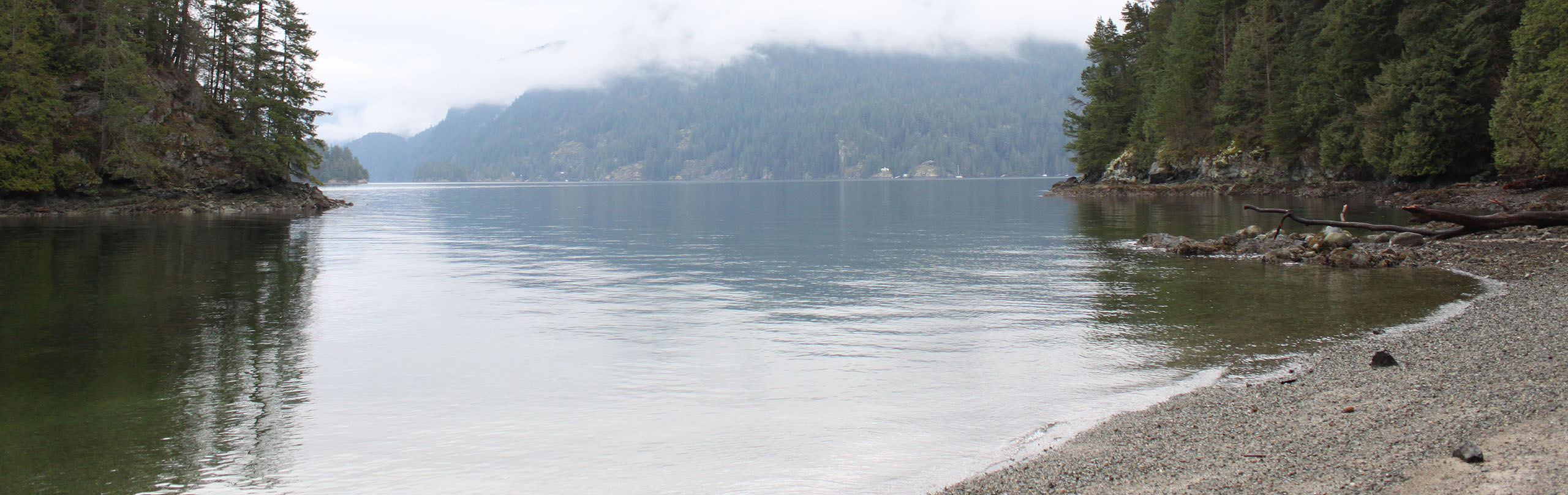 The view of Indian Arm from Jug Island Beach in Belcarra