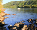 A view of a boat passing by along the trail to Admiralty Point