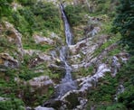 Flood Falls is a tall waterfall with a narrow band of water near Hope, BC